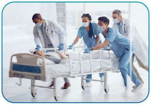 Hospital support staff assisting in a clinic corridor